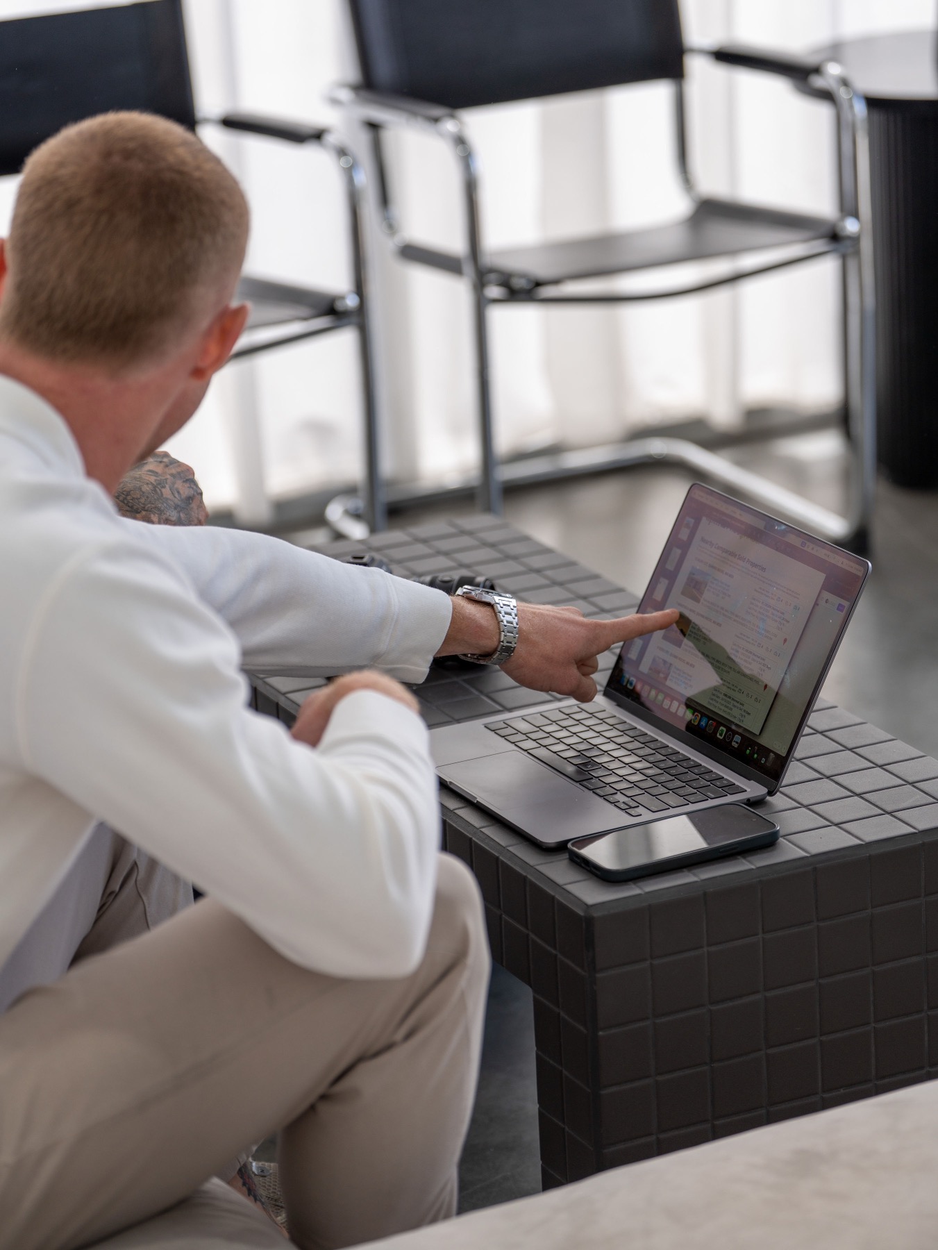 Brendan Tucek working through comparable sales on screen